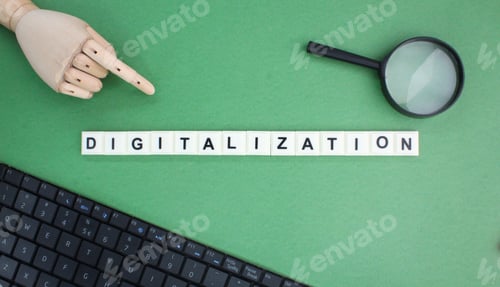 Preview: magnifying glass, laptop keyboard with the word digitization.