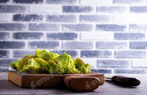 Preview: Broccoli. Fresh green broccoli on board.Top view. Free copy space.