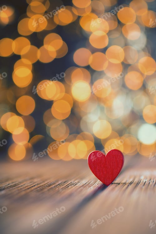 Red Heart on Wood with Bokeh Background