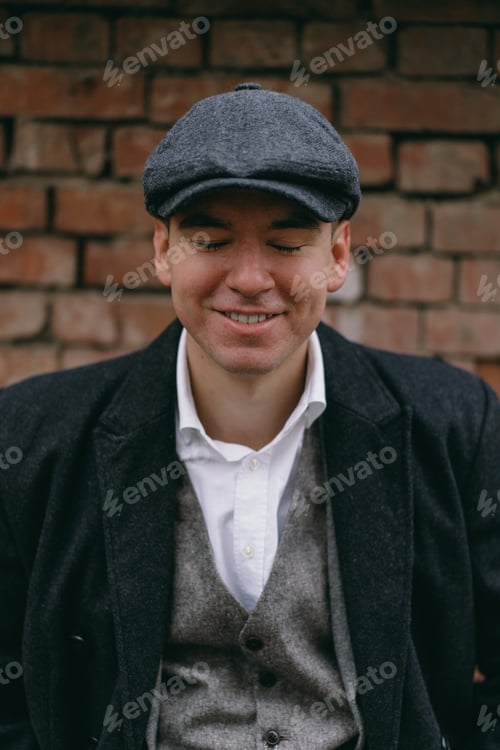 Preview: Portrait of a man in retro style. Peaky blinders. Vintage