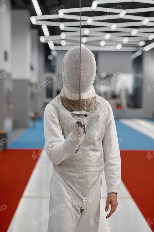 Preview: Sword sport athlete portrait wearing protective clothes and helmet at training
