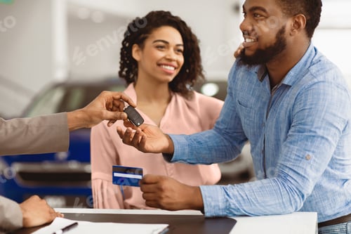 Preview: Afro Spouses Paying With Card Purchasing Car In Dealership Office