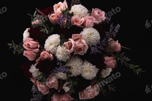 Preview: Closeup shot of a luxurious bouquet of pink roses and white, red dahlias on a black background