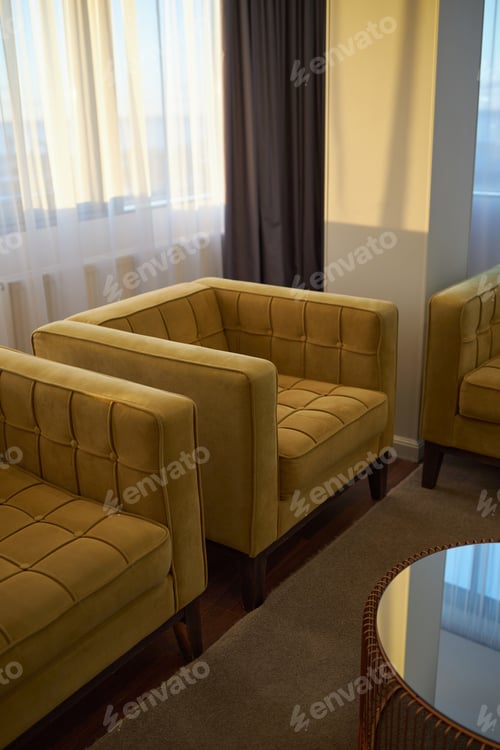 Preview: Modern Living Room Setting Featuring Plush Armchairs