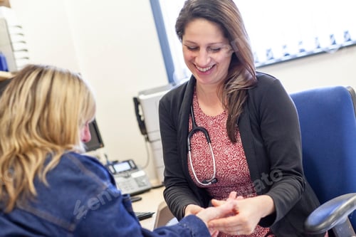 Preview: Doctor consulting with a patient in a medical practice