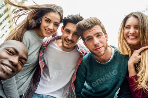 Preview: Multiracial group of friends taking selfie