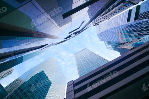 Preview: low angle view of singapore city buildings.
