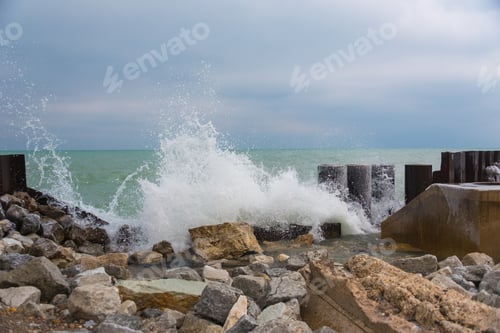 Preview: Lake Water Hitting The Rocks On A Cold Winter Day