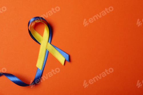 Preview: Down Syndrome awareness ribbons on orange background