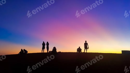 Preview: Red Sand Dune at Mui Ne Vietnam. Silhouettes of People Watching the Sunset on Sand Dunes