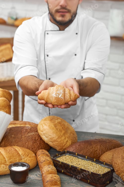 Preview: Professional baker working at his kitchen
