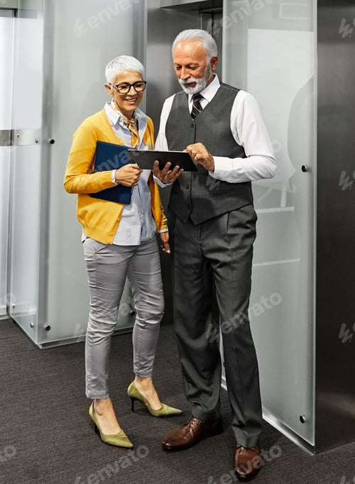 Preview: Senior business people at work