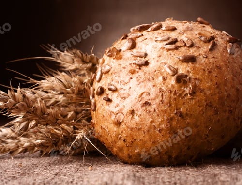 Preview: Loaf of bread and wheat ears still life