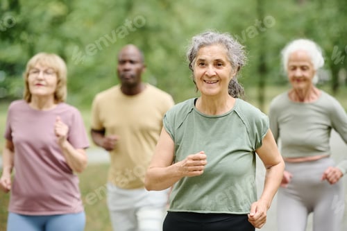 Preview: Senior woman running with her friends
