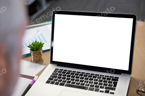 Preview: Laptop on desk at modern office