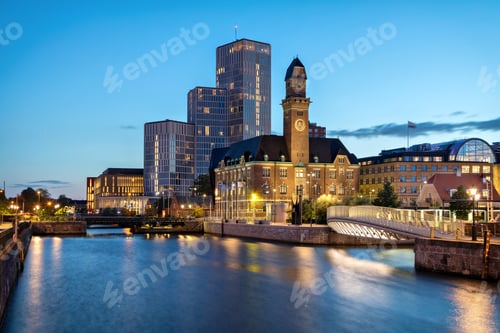Preview: Malmo, Sweden. Beautiful cityscape with canal and skyline at dusk