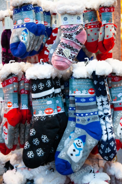 Preview: warm knitted socks with New Year's patterns on the shop window
