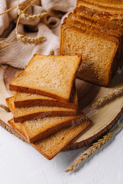 Preview: Board with slices of delicious toasted bread