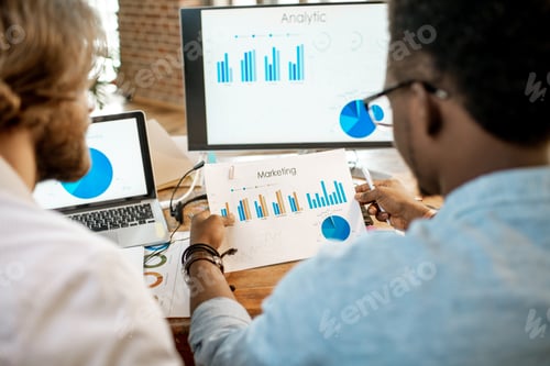 Preview: Coworkers working together with analytics