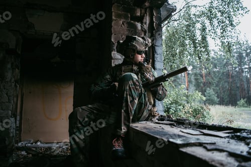 Preview: Soldier talking on the walkie-talkie inside the building, military concept
