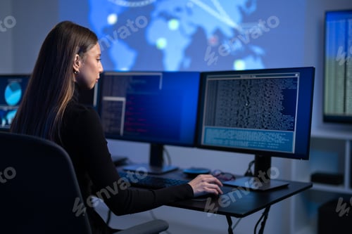 Preview: Busy Female IT Consultant in cyber security team working to prevent security threats, vulnerability