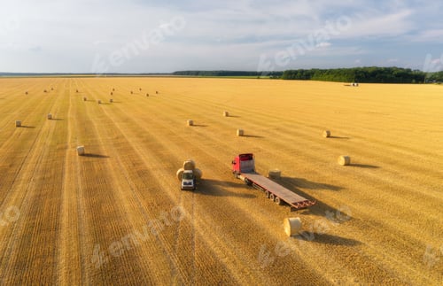 Preview: Aerial view of truck with hay bales. Agricultural machinery