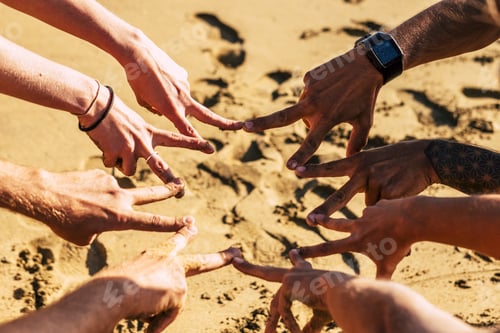 Preview: Team and cooperation friendship together concept with group of caucasian young hands