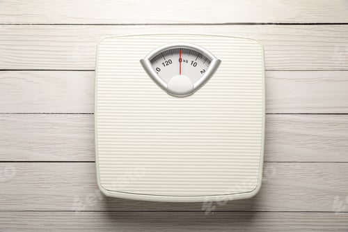 Preview: Weigh scales on white wooden table, top view. Overweight concept