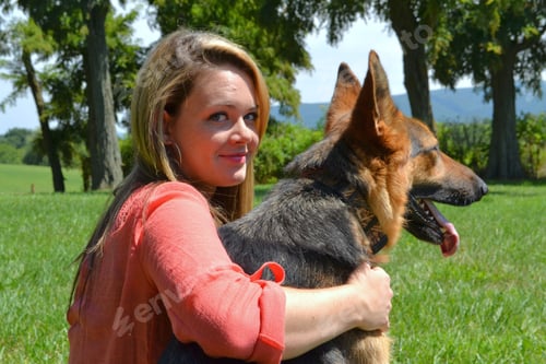 Preview: A pretty teenage girl with her German Shepherd dog for a casual portrait.