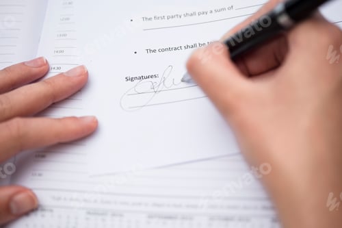 Preview: Woman signing documents