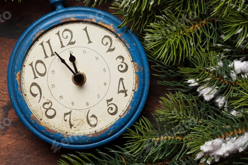 Preview: Christmas fir tree and alarm clock over old wood
