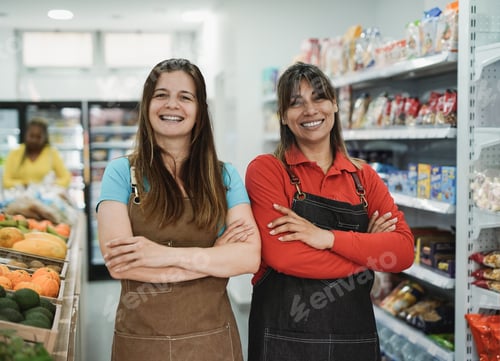 Preview: Mature women working together inside organic fresh minimarket