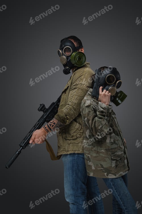 Preview: Little girl and man with gas masks against grey background