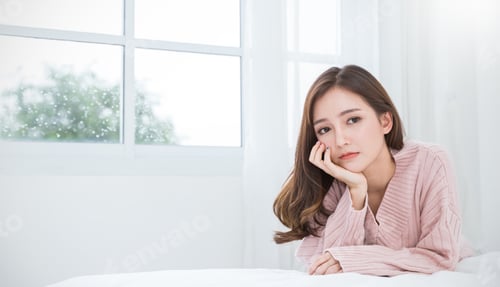Preview: Portrait of young beautiful asian woman feeling depress stressful in her bedroom