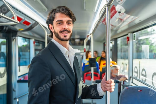 Preview: Young man commuting smiling on public bus transport