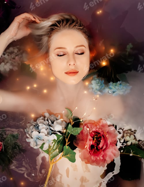Preview: Beautiful woman in bath-tub with flowers