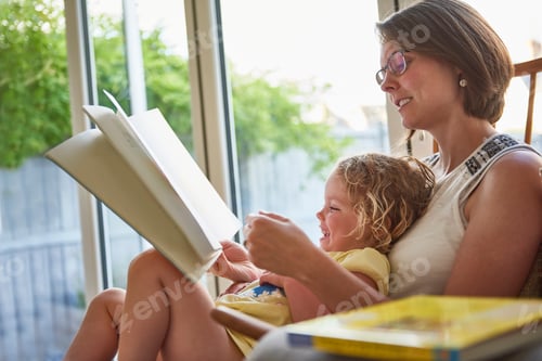 Preview: A moment of joy as mother and child share a storybook together.