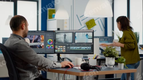 Preview: Videographer edits video project and cuts footage and sound