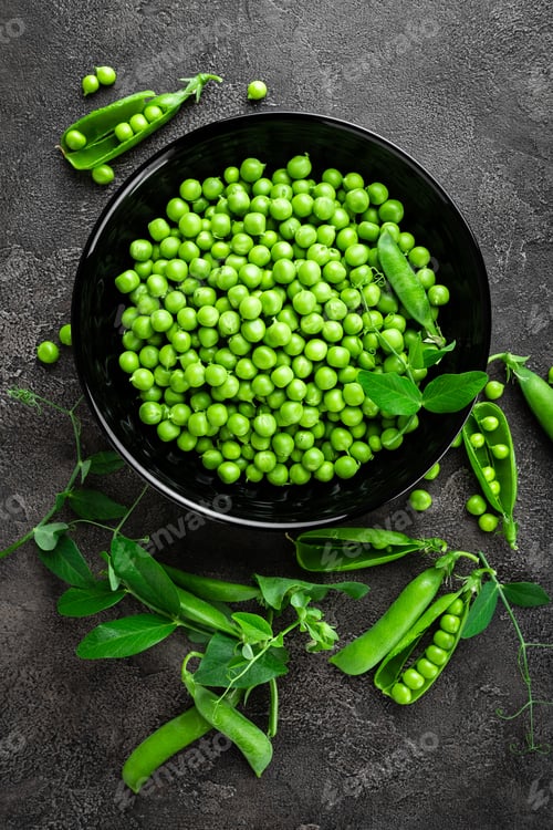 Preview: Green peas with pods and leaves