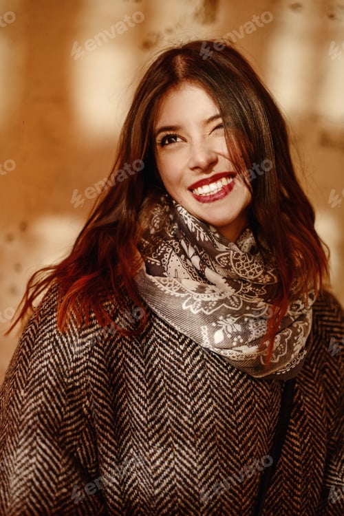 Preview: Happy and stylish pretty hipster woman holding film photo camera and smiling