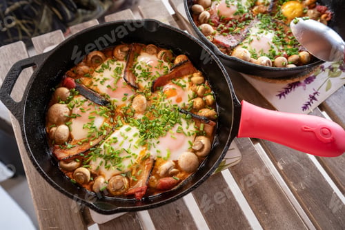Preview: Cypriot skillet baked eggs, Cyprus dish with bacon mushrooms and eggs
