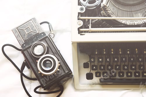 Preview: Vintage Typewriter and Camera on White Fabric