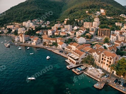 Preview: Promenade with old houses and moored boats. Tivat, Montenegro. Drone