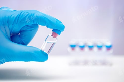 Preview: Close up on vaccine and medical syringe