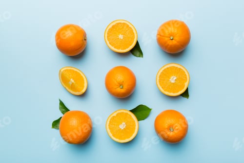 Preview: Fruit pattern of fresh orange slices on colored background. Top view. Copy Space