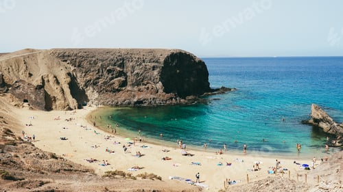 Preview: Top view of Lanzarote Playa Del Papagayo beach during summer season