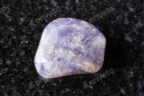Preview: sample of polished cordierite mineral on black