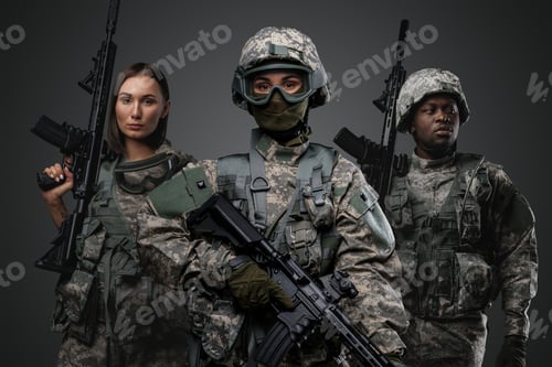 Preview: Multinational squad of three soldiers against grey background