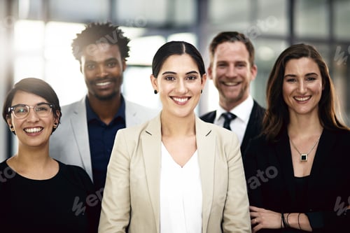 Preview: We are the benchmark. Cropped portrait of a group of businesspeople standing in the office.