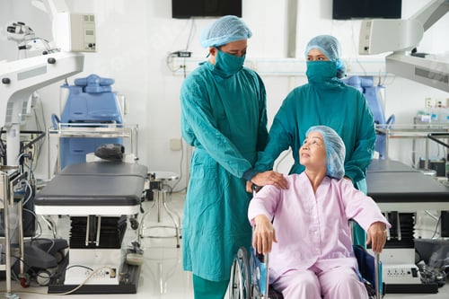 Preview: Doctors and patient in operating theater